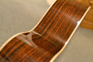Solid rosewood back and sides.